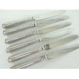 SET OF SIX SILVER HANDLED & BLADED KNIVES (6)