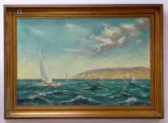 L. KOHN oil on canvas - a view of sailing dinghies off the South Coast, signed, 59 x 90cms