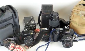 ASSORTED CAMERA EQUIPMENT including Minolta 7000SLR with two zoom lenses, Pentax P30 SLR with