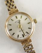 9CT GOLD LADIES ROTARY WRISTWATCH having 9ct gold brick design bracelet, 16.6gms.