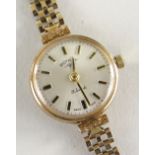 9CT GOLD LADIES ROTARY WRISTWATCH having 9ct gold brick design bracelet, 16.6gms.