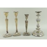 PAIR OF MATCHING SILVER CANDLESTICKS, an EPNS candlestick and another silver candlestick (4)