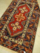 SMALL BLUE GROUND CAUCASIAN RUG, 203 x 116cms