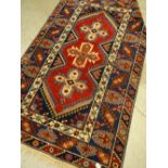 SMALL BLUE GROUND CAUCASIAN RUG, 203 x 116cms