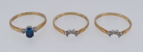 THREE 9CT GOLD RINGS set with diamond chips, 5g