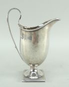 VICTORIAN SILVER CREAM JUG, Sheffield 1897 by Henry Stratford, with reeded lop handle, square