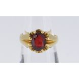 22CT GOLD GARNET CLAW SET RING, 8.5gms