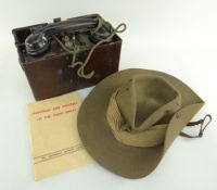 GERMAN WWII FIELD TELEPHONE & THIRD REICH MANUAL together with a WWII period hat (3)