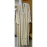 OSSIE CLARK FOR RADLEY, an ivory moss crepe gown with apricot lining, label to collar, size 12