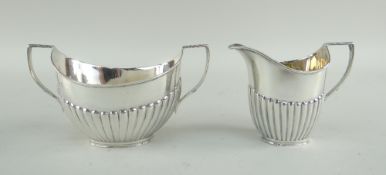 MATCHING VICTORIAN SILVER HALF-FLUTED SUCRIER & CREAM JUG, London 1884, by William Hutton & Sons,