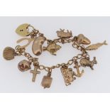 9CT GOLD CHARM BRACELET, 14g