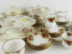 TWO ALFRED MEAKIN ROSE PRINTED DINNER SERVICES FOR SIX, a Staffordshire and Royal Albert tea