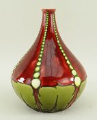 RARE MINTONS LTD SECESSIONIST VASE, NO. 28, tube-line decorated in dark red and olive glazes,