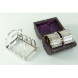 BOXED PAIR VICTORIAN SILVER NAPKIN RINGS, London 1876, engraved with butterflies and initials, and