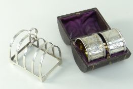 BOXED PAIR VICTORIAN SILVER NAPKIN RINGS, London 1876, engraved with butterflies and initials, and