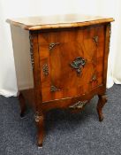 FRENCH-STYLE SERPENTINE WALNUT CUPBOARD with interior shelf and gilt metal mounts