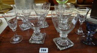 GROUP OF ASSORTED GLASSWARE including five star etched glasses on square section bases, green and