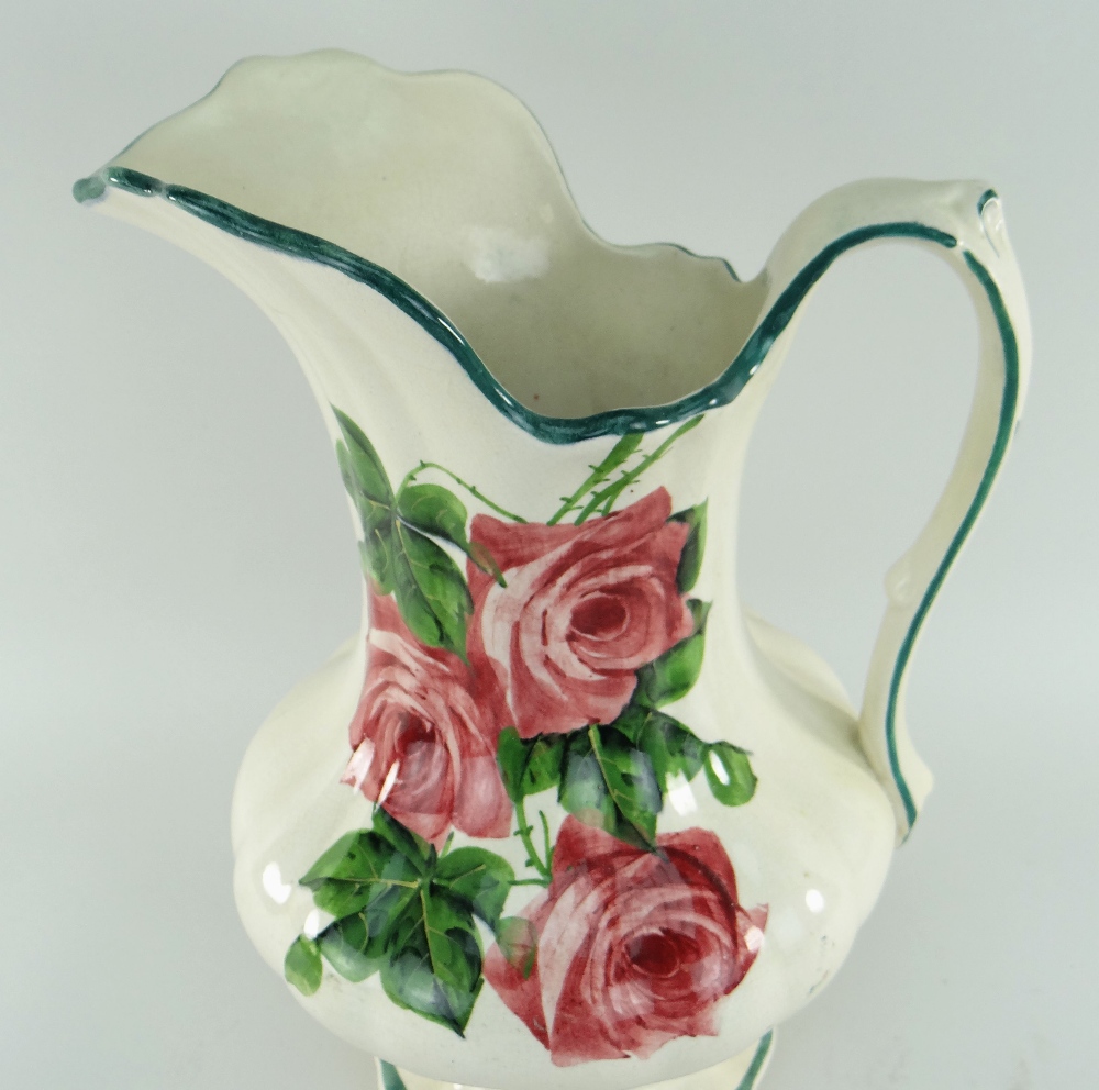 LLANELLY POTTERY TOILET JUG painted with roses, bellied and fluted body over a circular lobed foot - Image 2 of 3