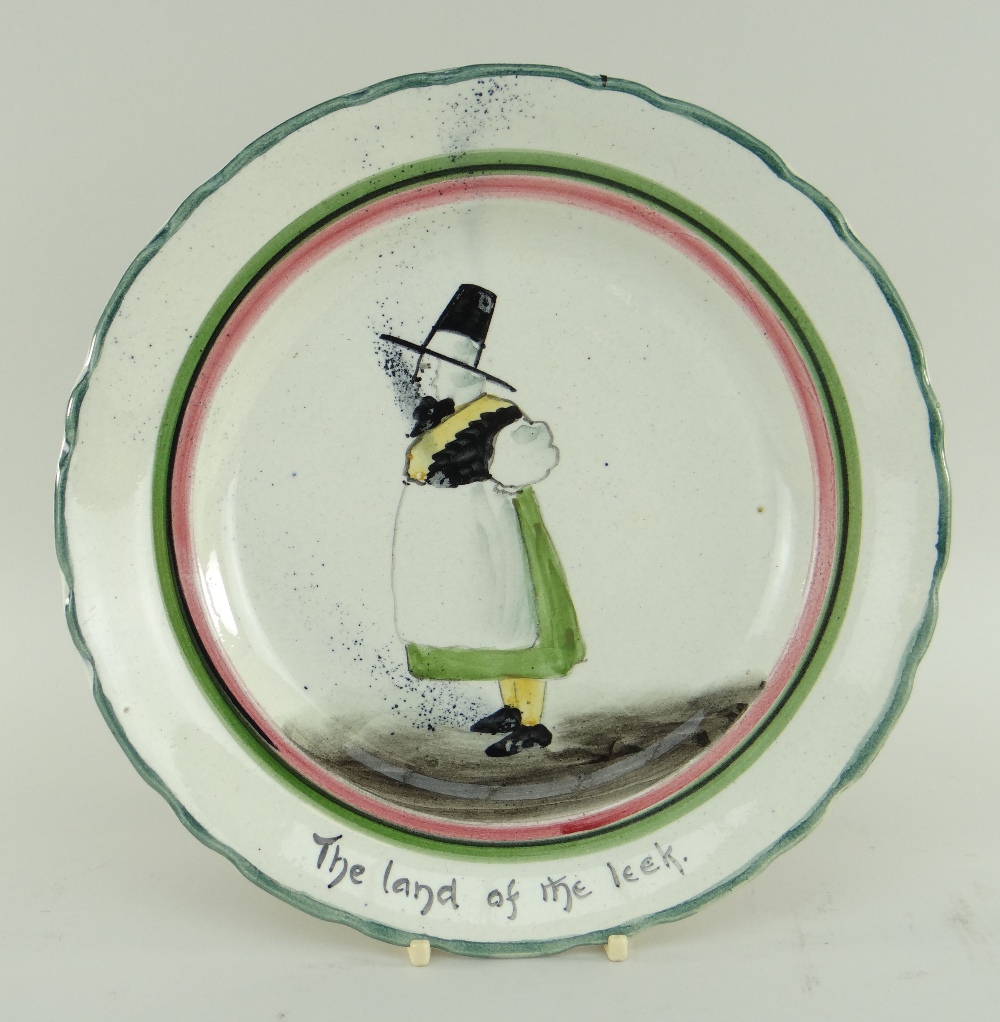 RARE LLANELLY POTTERY DINNER PLATE painted with a standing figure of Mari Jones over the inscription