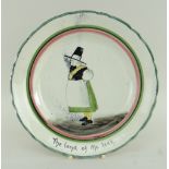 RARE LLANELLY POTTERY DINNER PLATE painted with a standing figure of Mari Jones over the inscription