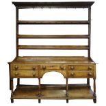 EARLY NINETEENTH CENTURY CILYCWM OAK HIGH DRESSER, CARMARTHENSHIRE, open delft rack with hand