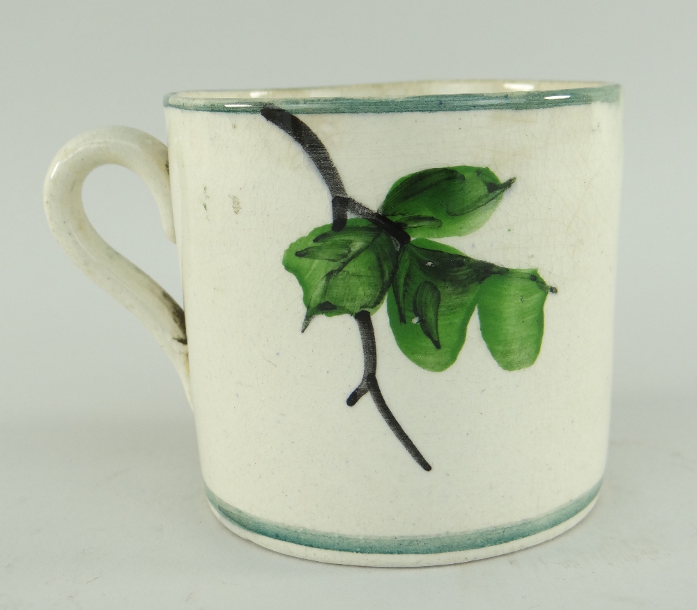 SMALL LLANELLY POTTERY MUG PAINTED WITH PLUMS on a branch, stencilled Llanelly to base, 7cms high - Image 2 of 2