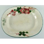 LLANELLY POTTERY MEAT PLATTER painted with briar roses with leaves, of rounded form, 41cms Condition