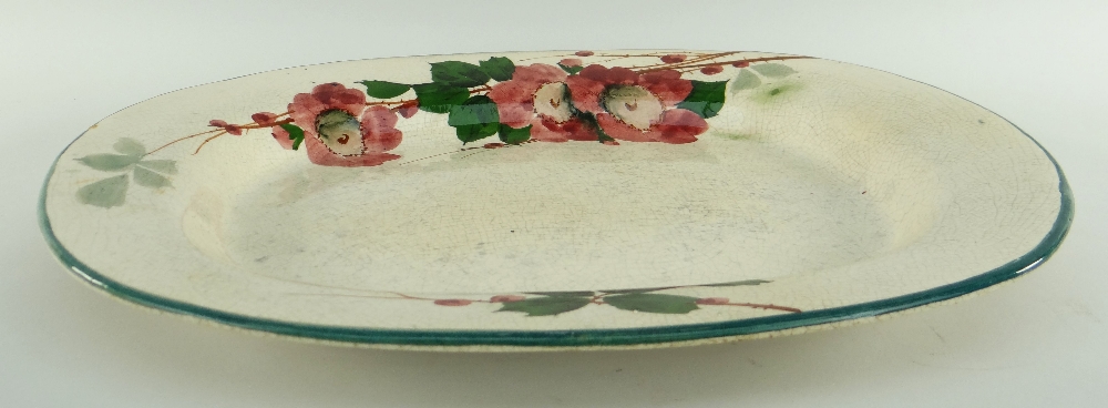 LLANELLY POTTERY MEAT PLATTER painted with briar roses with leaves, of rounded form, 41cms Condition - Image 2 of 2