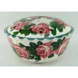 LLANELLY POTTERY ROSE BOWL painted with tea roses and foliage, circular footed with crimped rim, the