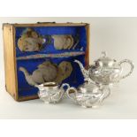 FINE BOXED CHINESE EXPORT SILVER THREE-PIECE TEASET BY WANG HING, c.1900 of bombe form, each