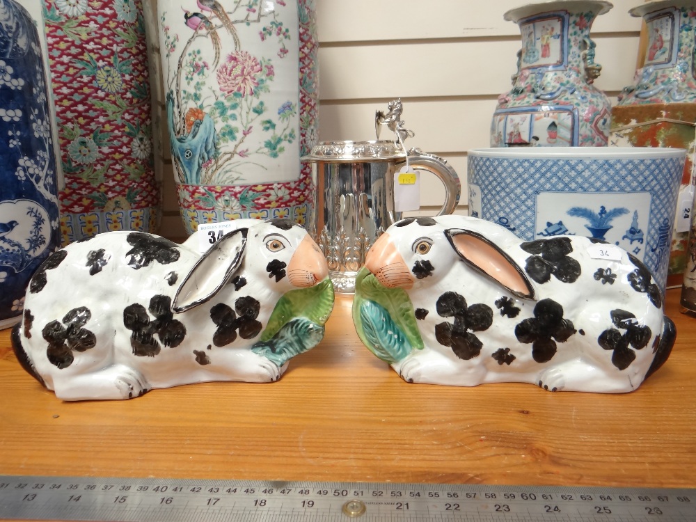 RARE PAIR OF VICTORIAN STAFFORDSHIRE POTTERY MODELS OF RABBITS, recumbent with lettuce leaves in - Image 9 of 14