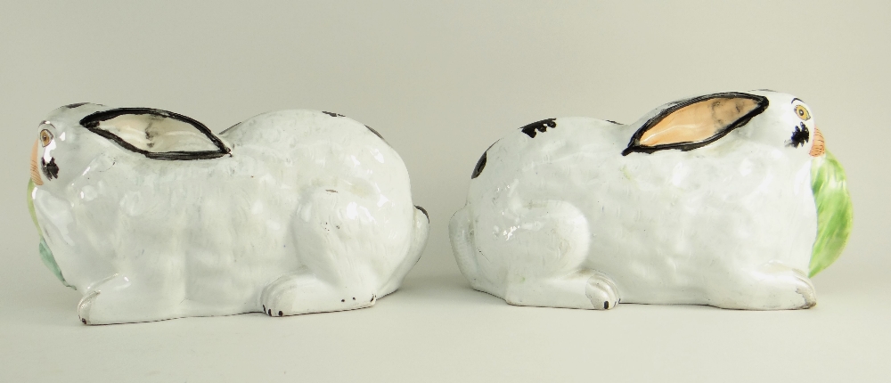 RARE PAIR OF VICTORIAN STAFFORDSHIRE POTTERY MODELS OF RABBITS, recumbent with lettuce leaves in - Image 2 of 14