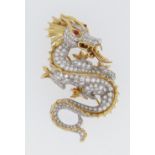 McTEIGUE 18CT GOLD DIAMOND ENCRUSTED DRAGON DESIGN BAR BROOCH, the dragon looking back over its