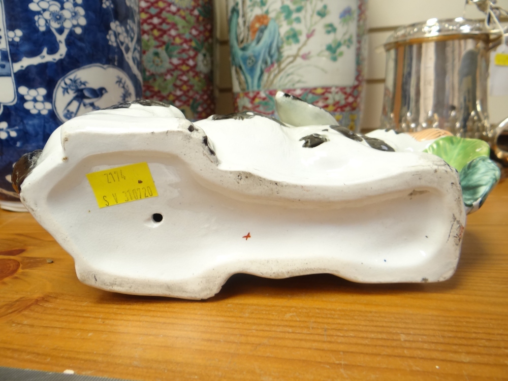 RARE PAIR OF VICTORIAN STAFFORDSHIRE POTTERY MODELS OF RABBITS, recumbent with lettuce leaves in - Image 11 of 14