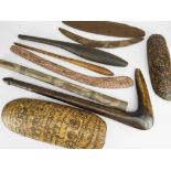 COLLECTION OF ABORIGINAL ARTEFACTS comprising two pyrographed coolamons, two boomerangs, leangle