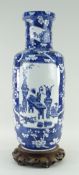 CHINESE BLUE & WHITE PORCELAIN ROULEAU VASE, 19TH CENTURY, painted with panels of antiques and