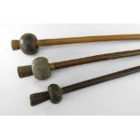 THREE NEW BRITAIN STONE HEAD CLUBS, longest 23cms (3)