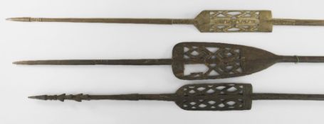 THREE ASMAT SPEARS, Southern Papua Province, Indonesian New Guinea, two with feather ornaments,