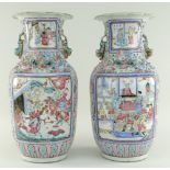 PAIR OF CHINESE CANTON FAMILLE ROSE PORCELAIN BALUSTER VASES, 19th Century, with everted petal
