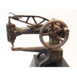 VICTORIAN SINGER SEWING MACHINE, MODEL 29K4, the leather working or cobblers model mounted on a cast