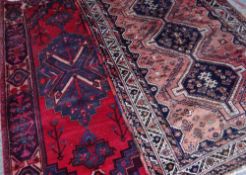 TWO ORIENTAL TRIBAL RUGS both North West Persia, largest 250 x 132cms (2) Condition Report: all with