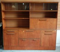 MID-CENTURY TEAK TWO-CASE MODULAR CABINET, 180cms wide