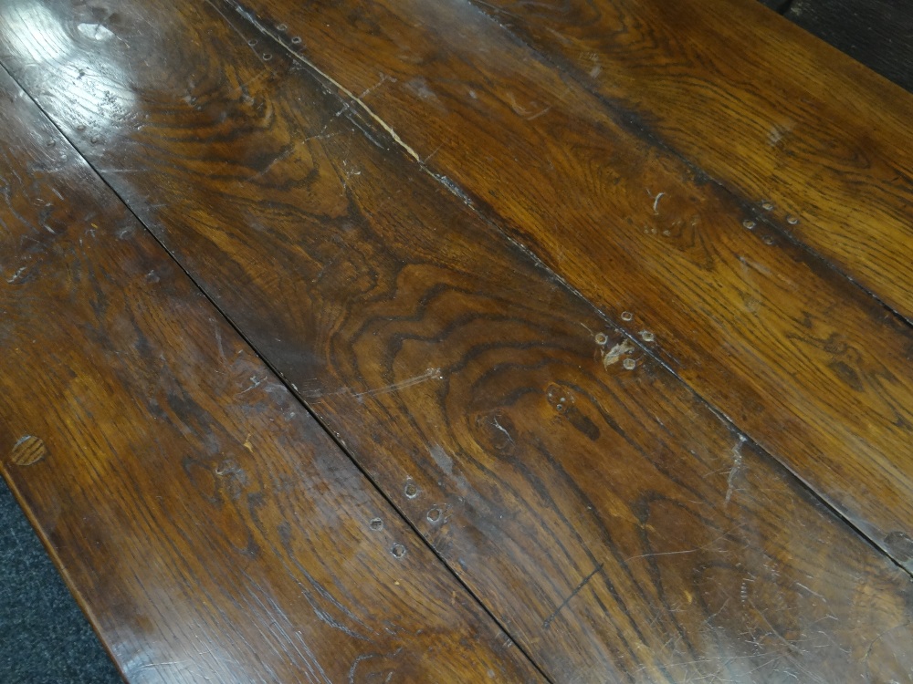 ANTIQUE ELM REFECTORY TABLE the four plank top with cleated ends on square baluster trestle end - Image 11 of 15