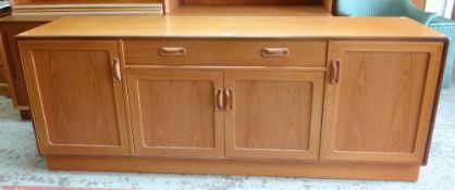 MID-CENTURY G-PLAN TEAK SIDEBOARD, fitted drawers and cupboards, red and gold label, 186cms wide