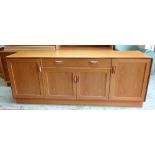 MID-CENTURY G-PLAN TEAK SIDEBOARD, fitted drawers and cupboards, red and gold label, 186cms wide