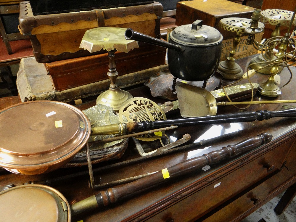 ASSORTED METALWARE including brass fire antiques, copper warming pans, cast iron trivets, enameled