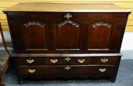 18TH CENTURY WELSH OAK MULE CHEST with later hinged panelled top, enclosing wine rack, triple