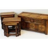 TWO ELIZABETHAN-STYLE OAK NESTS OF OCCASIONAL TABLES and a coffer similar (6)