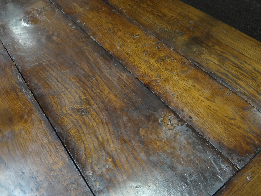 ANTIQUE ELM REFECTORY TABLE the four plank top with cleated ends on square baluster trestle end - Image 7 of 15