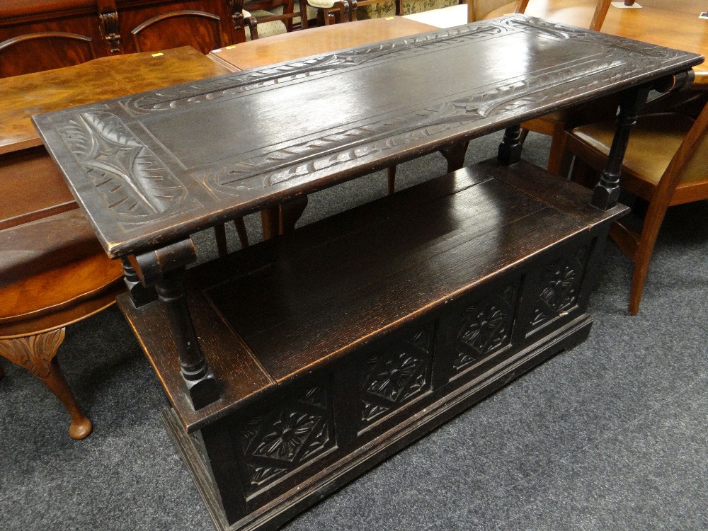 17TH CENTURY-STYLE CARVED OAK MONKS BENCH carved top and hinged box base, 122cms wide - Image 4 of 4